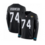 Men's Nike Jacksonville Jaguars #74 Cam Robinson Limited Black Therma Long Sleeve NFL Jersey