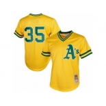 Men's Mitchell and Ness Oakland Athletics #35 Rickey Henderson Replica Gold 1984 Throwback MLB Jersey