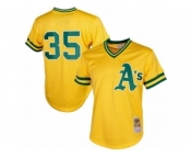 Men's Mitchell and Ness Oakland Athletics #35 Rickey Henderson Replica Gold 1984 Throwback MLB Jersey