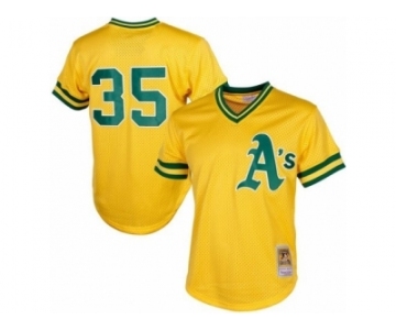 Men's Mitchell and Ness Oakland Athletics #35 Rickey Henderson Replica Gold 1984 Throwback MLB Jersey