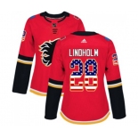 Women Calgary Flames #28 Elias Lindholm Authentic Red USA Flag Fashion Hockey Jersey