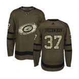 Men's Carolina Hurricanes #37 Andrei Svechnikov Green Salute to Service Stitched Hockey Jersey