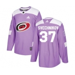 Men's Carolina Hurricanes #37 Andrei Svechnikov Purple Fights Cancer Stitched Hockey Jersey