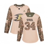 Women Anaheim Ducks #34 Sam Steel Authentic Camo Veterans Day Practice Hockey Jersey